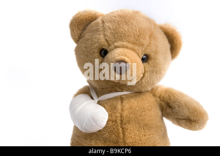 Spielzeug-Bär mit einem gebrochenen Bein Stockfoto