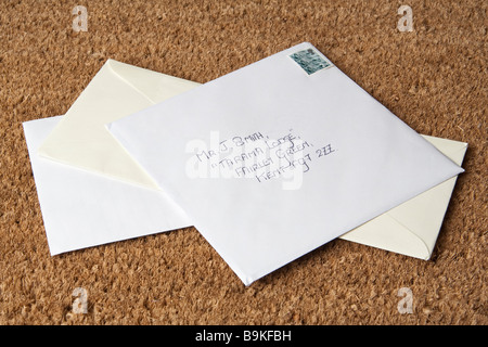 Buchstaben auf der Matte, UK. Stockfoto