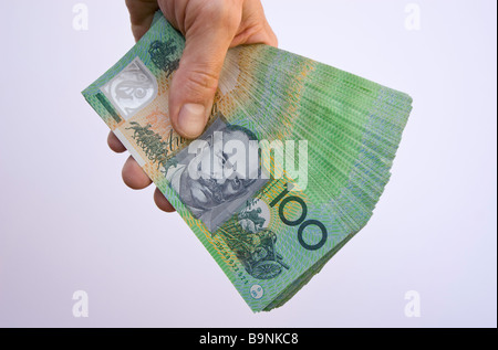 Ein Fan von einem$ 20.000 Aus $20.000 20 000 australische Dollar in einer hand Stockfoto