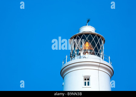 Southwold Leuchtturm mit Licht in der Dämmerung die Arbeit an der Küste von Suffolk Stockfoto