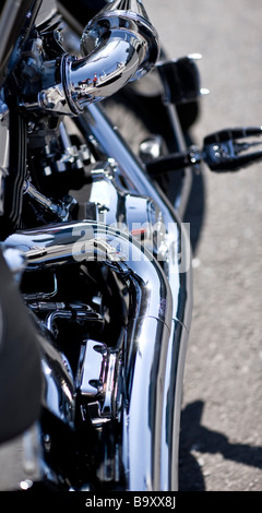 Motorrad, Motorrad, Harey Davidson glänzende Rohre Stockfoto