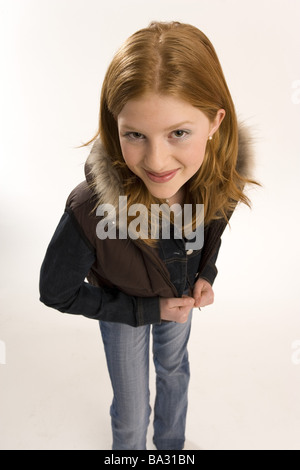 Mädchen rot-behaarte Blick Kameraserie Detail Personen 10-15 Jahre 13 Jahre Jugendliche Teenager-Mädchen langhaarige Jeans-Jacke Weste Stockfoto