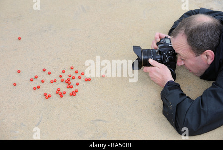 Ein Fotograf bei der Weltmeisterschaft Murmeln in Tinsley Green Crawley, Großbritannien. Bild von Jim Holden. Stockfoto