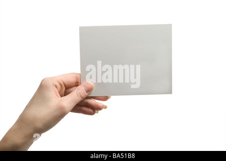 Hand, die ein leeres Blatt Papier-Zeichen vor einem weißen Hintergrund Stockfoto