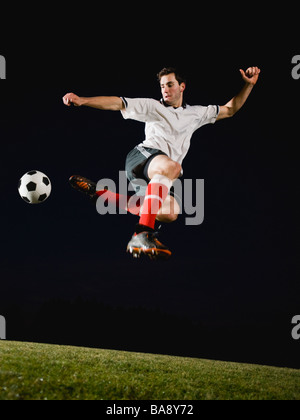 Fußball Spieler munter Stockfoto