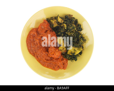 Chicken Tikka Masala mit Sag Aloo Stockfoto