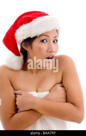 junge Frau in Handtuch Weihnachten Hut Stockfoto