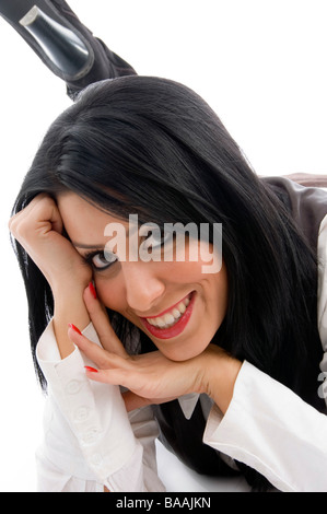 junge Frau lächelt in die Kamera Stockfoto