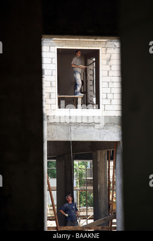 Bau-Arbeiter in einem Haus, Poznan, Polen Stockfoto