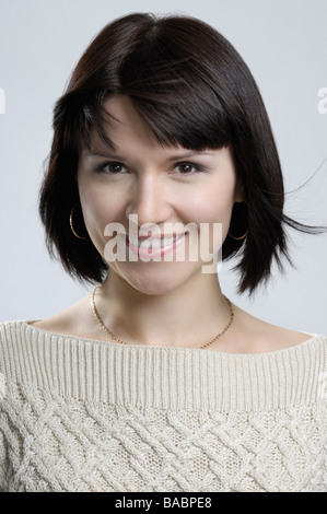Portrait von lächelnden jungen Frau Stockfoto