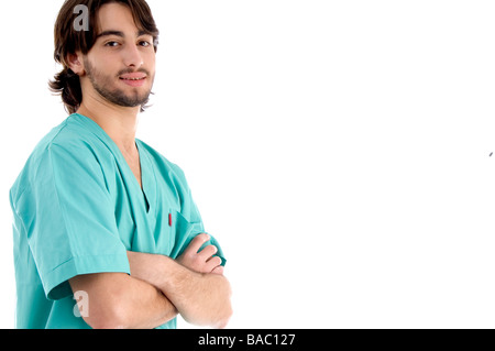 junge Chirurgen posiert mit verschränkten Armen Stockfoto