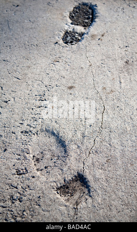 Fußabdrücke in Beton eingeprägt, Finnland Stockfoto