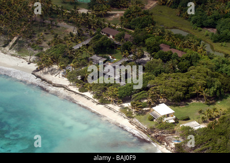 Mustique ist einer kleinen privaten Insel in der Karibik am Rande des karibischen Meeres. Abgebildet ist Mick Jaggers Hause Ariel Stockfoto