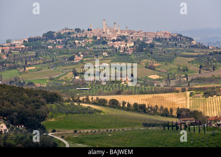 Das mittelalterliche Dorf von San Gimignano in der Toskana (Italien). Village Médiéval de San Gimignano, En Toscane (Italien). Stockfoto