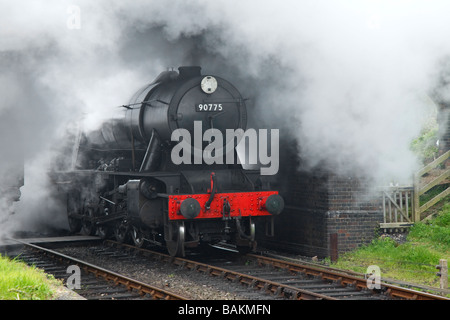 Ein "Dampflokomotive" sitzt am "Weybourne Station" auf der "North Norfolk Railway" bekannt als "The Poppy Line" East Anglia, Großbritannien Stockfoto