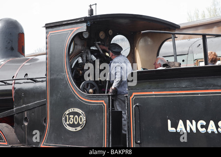 Ein "Dampflokomotive" sitzt am "Weybourne Station" auf der "North Norfolk Railway" bekannt als "The Poppy Line" East Anglia, Großbritannien Stockfoto