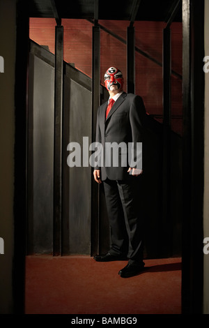 Mann mit Business-Anzug, mit Bemalung Stockfoto