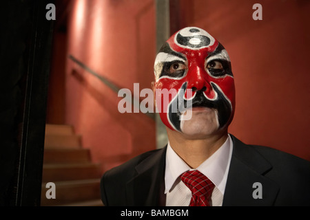 Mann mit Business-Anzug, mit Bemalung Stockfoto