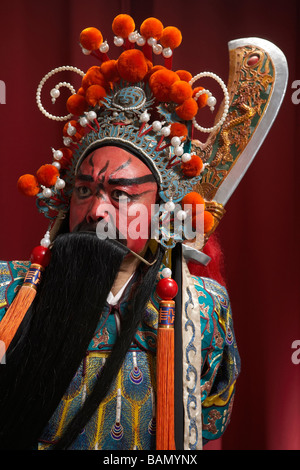 Guang Gong, alten chinesischen General in Beijing Opera Kostüm, steht für Schutz und Wohlstand Stockfoto