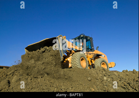 Frontlader, Aushub von Kellern für neue Wohn Häuser Stockfoto