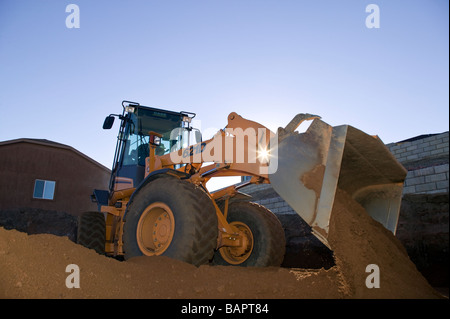 Frontlader, Aushub von Kellern für neue Wohn Häuser Stockfoto