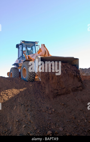 Frontlader, Aushub von Kellern für neue Wohn Häuser Stockfoto