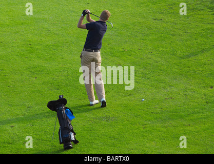 Golfer in Aktion Stockfoto