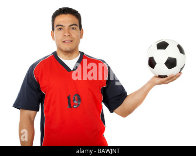 männlichen Fußballer halten einen Fußball Stockfoto