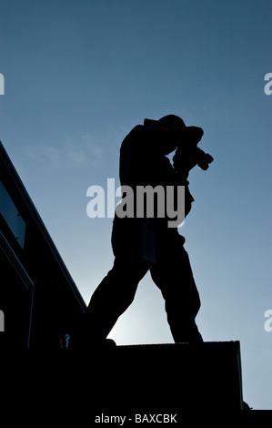 Fotograf-Silhouette des Gebäudes Stockfoto