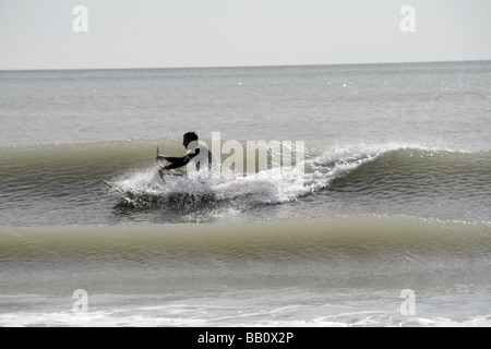 ein Kanute Meer Wellen in Ostia Italien Stockfoto