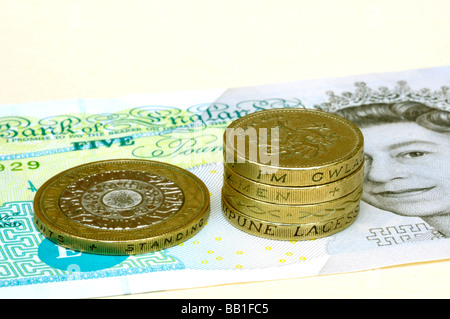 Großbritannien UK Pfund-Banknoten und-Münzen Stockfoto