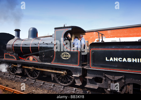 Ein "Dampflokomotive" sitzt am "Weybourne Station" auf der "North Norfolk Railway" bekannt als "The Poppy Line" East Anglia, Großbritannien Stockfoto