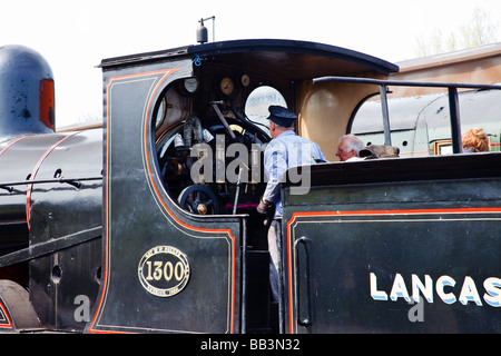 Ein "Dampflokomotive" sitzt am "Weybourne Station" auf der "North Norfolk Railway" bekannt als "The Poppy Line" East Anglia, Großbritannien Stockfoto