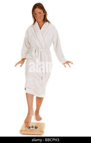 Weibliche immer auf Bad skaliert sich wiegen Stockfoto