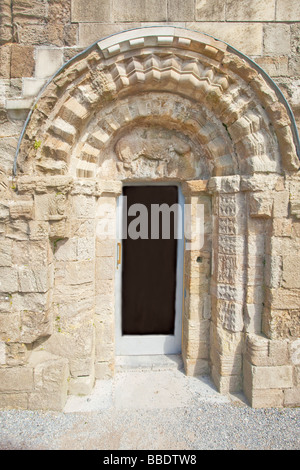 Mittelalterliche romanische Carving über Eingangstür, Cormac es Kapelle Rock of Cashel County Co Tipperary Eire irische Republik Irland Stockfoto