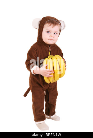 Baby Affen Kostüm mit Bananen Stockfoto