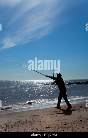 Casting am Withernsea Strand Stockfoto