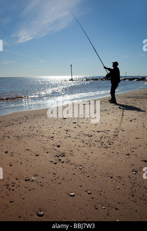 Casting am Withernsea Strand Stockfoto