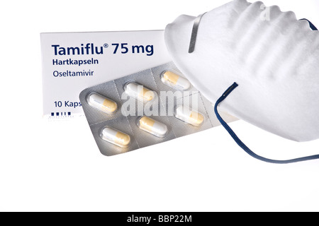 Tamiflu mit einer Maske Stockfoto