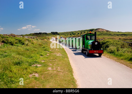 Die Noddy Land Zug die Passagiere entlang Hengistbury Head Stockfoto