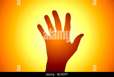 männliche Menschenhand Silhouette gegen orange Leuchten Stockfoto