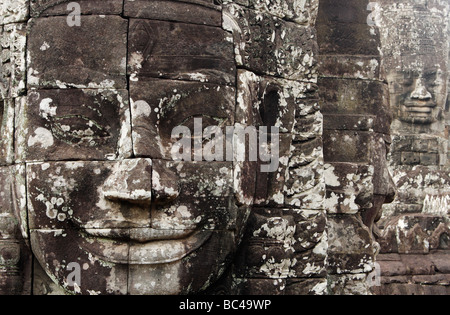 Großen lächelndes Gesicht in Stein gemeißelt, Bayon Tempel Ruinen, [Angkor Thom], Kambodscha Stockfoto