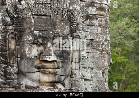 Bayon Tempelturm, geschnitzten Stein Gesicht [Angkor Thom], Kambodscha, Südost-Asien Stockfoto