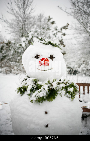 Ein wunderschön gebauten Schneemann in einem Park in Fulham, London. Stockfoto Ein wunderschön gebauten Schneemann in einem Park in Fulham, London. Stockfoto