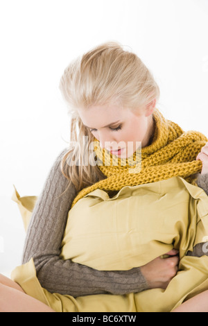 junge Frau schlecht fühlen Stockfoto