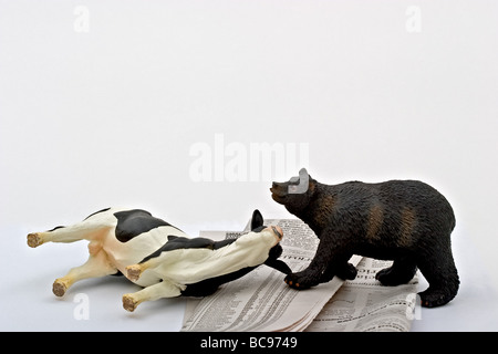 Tragen Sie stehend von einem Stier liegen auf der Seite auf eine Börsennotierung. Stockfoto