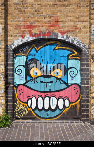 Affe Gesicht Graffiti. Hackney, East London, England, UK Stockfoto