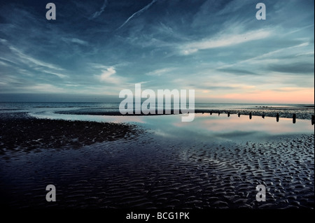 Sonnenuntergang am Strand von Winchelsea East Sussex England UK Stockfoto