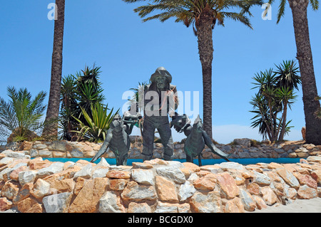 Statue von Fischer und Meerjungfrauen am Strand in Los Alcazares, Mar Menor, Murcia, Costa Calida, Süd Osten Spaniens Stockfoto