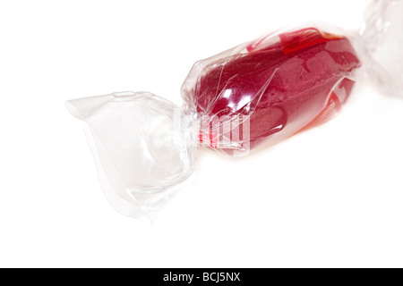 rote Süßigkeit in klaren Zellophan Folie gewickelt Makro Stockfoto
